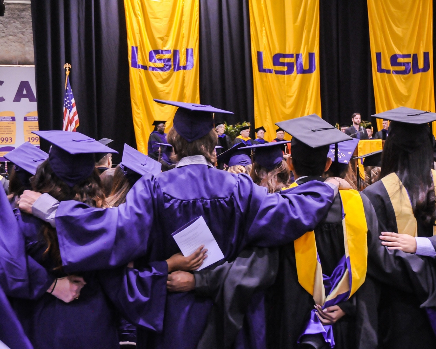 Students standing at graduation