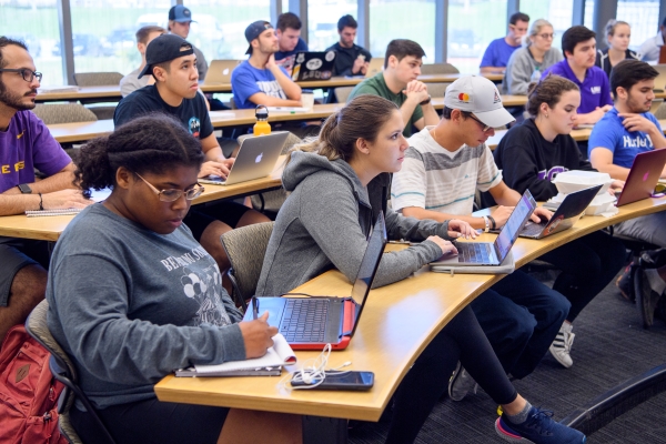 students in a classroom listening to a lecture