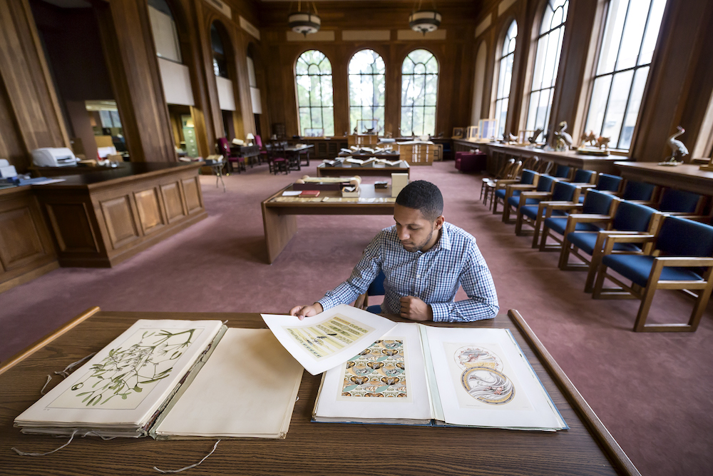 student in library