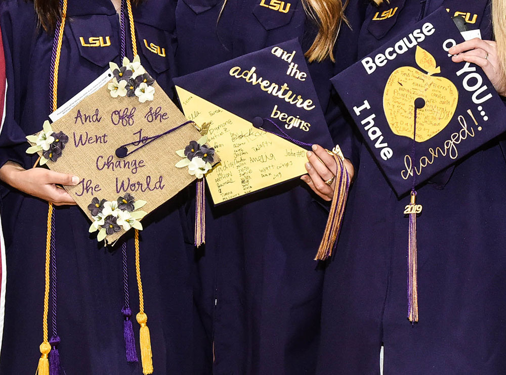 three graduation caps