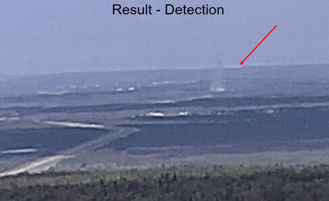 Long-range image showing arrow pointing to smoke with the words "Result - Detection" displayede risk map using red and green areas to designation wildfire-prone areasd