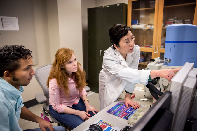 teacher and student in lab