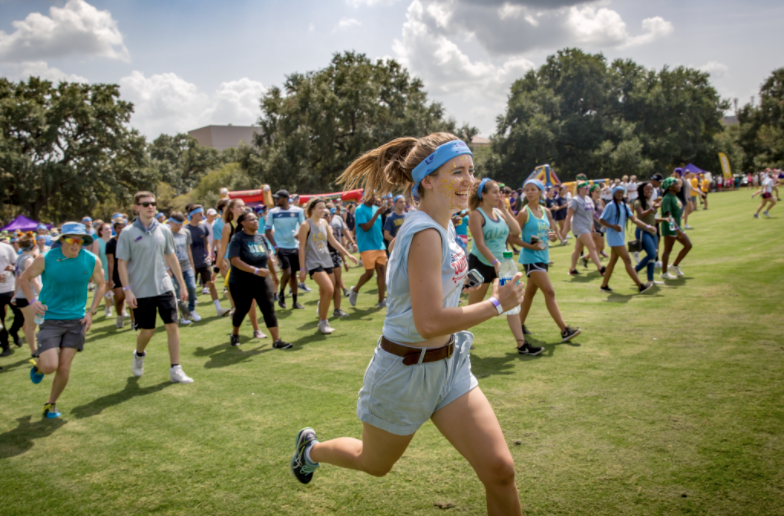 student running at tiger games