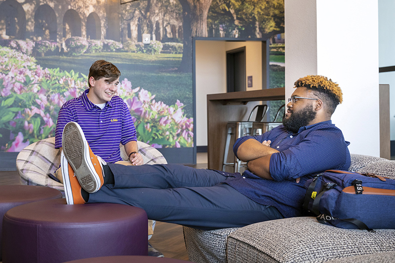 students lounging in res hall