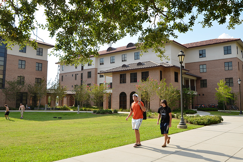 student walking past north hall